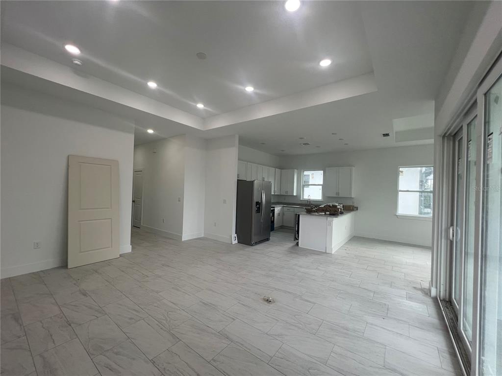 187 Sesame Road East Rotonda West, FL 33947 - Photo 4 of 28 a view of a big room with closet and windows