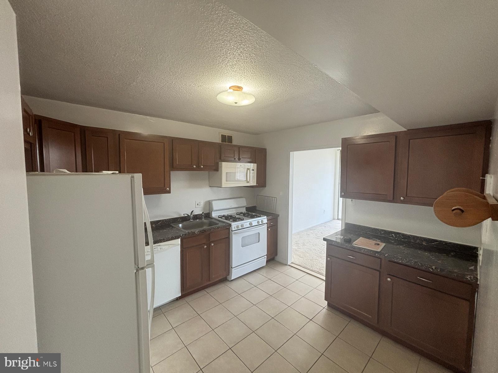 1836 Metzerott Road, Unit 1720 Hyattsville, MD 20783 - Photo 12 of 35 Cozy kitchen with modern finishes.