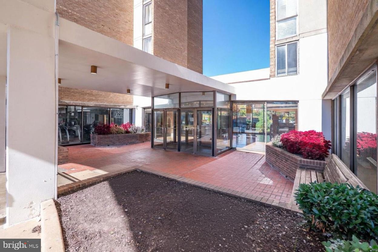 1836 Metzerott Road, Unit 1720 Hyattsville, MD 20783 - Photo 25 of 35 Inviting courtyard with vibrant greenery.