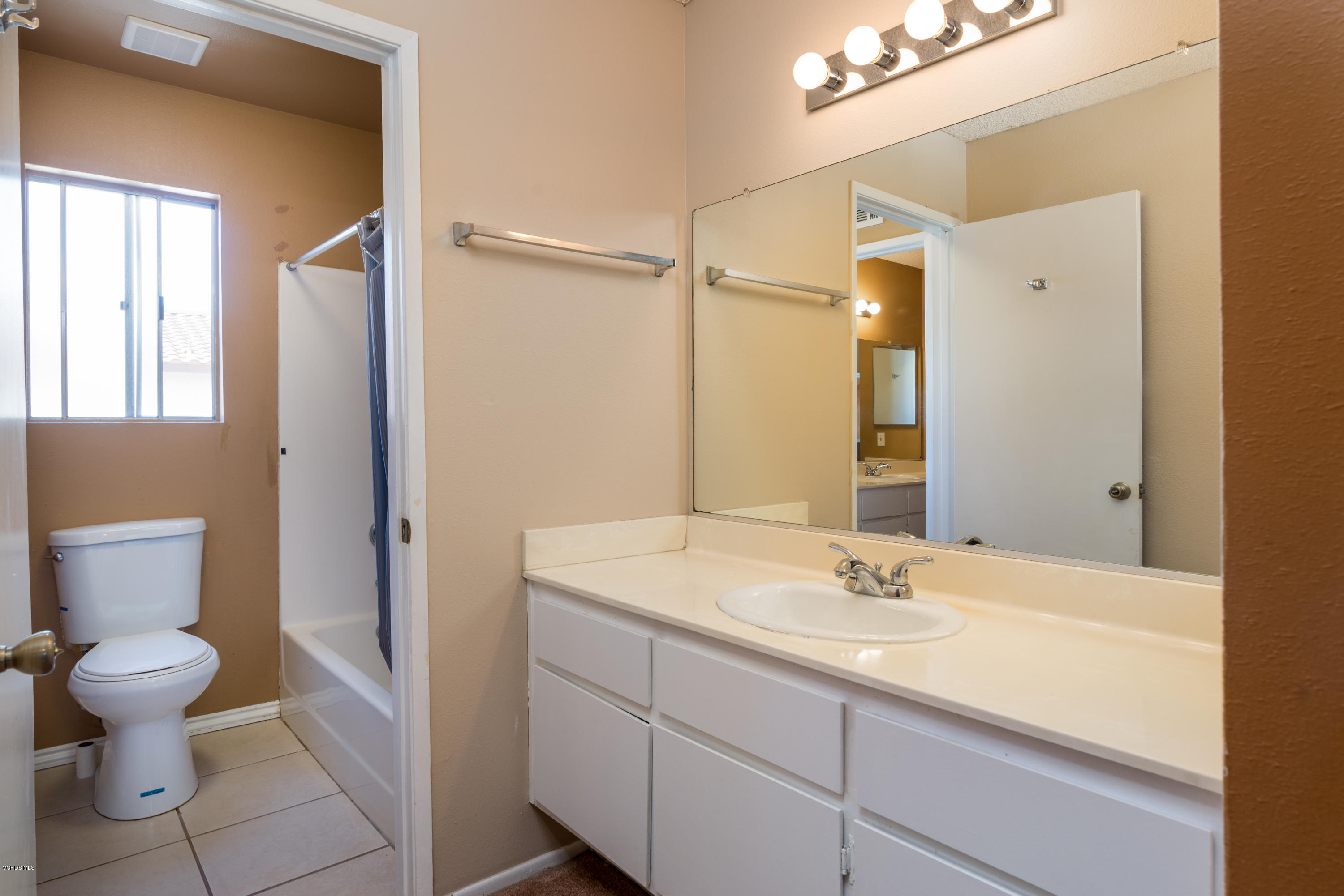433 Percy Street Oxnard, CA 93033 - Photo 17 of 26 a bathroom with a sink toilet and shower