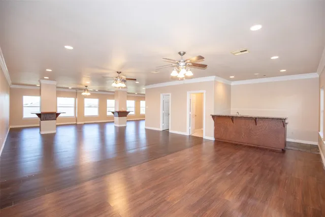 a kitchen with granite countertop a sink and a stove