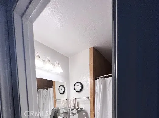 a kitchen with a refrigerator a sink and a stove