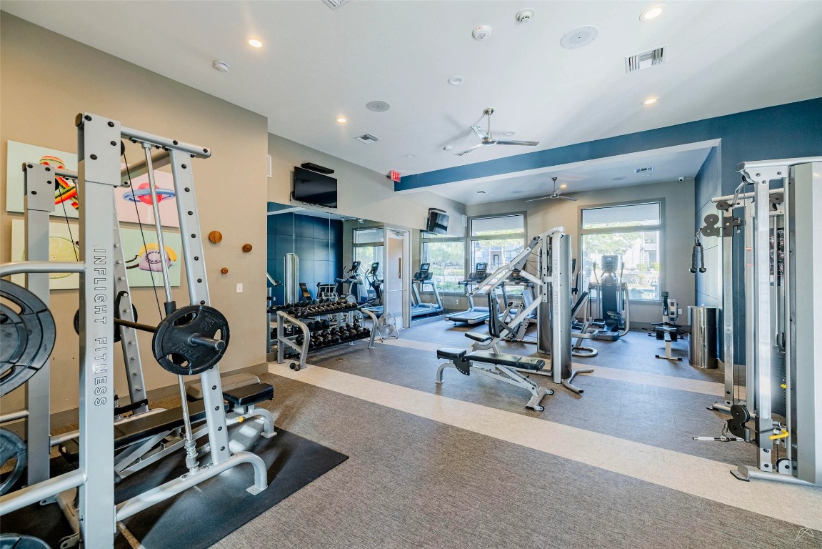 8515 Interstate 35, Unit 11102 Austin, TX 78744 - Photo 24 of 25 Gym with ceiling fan and recessed lighting