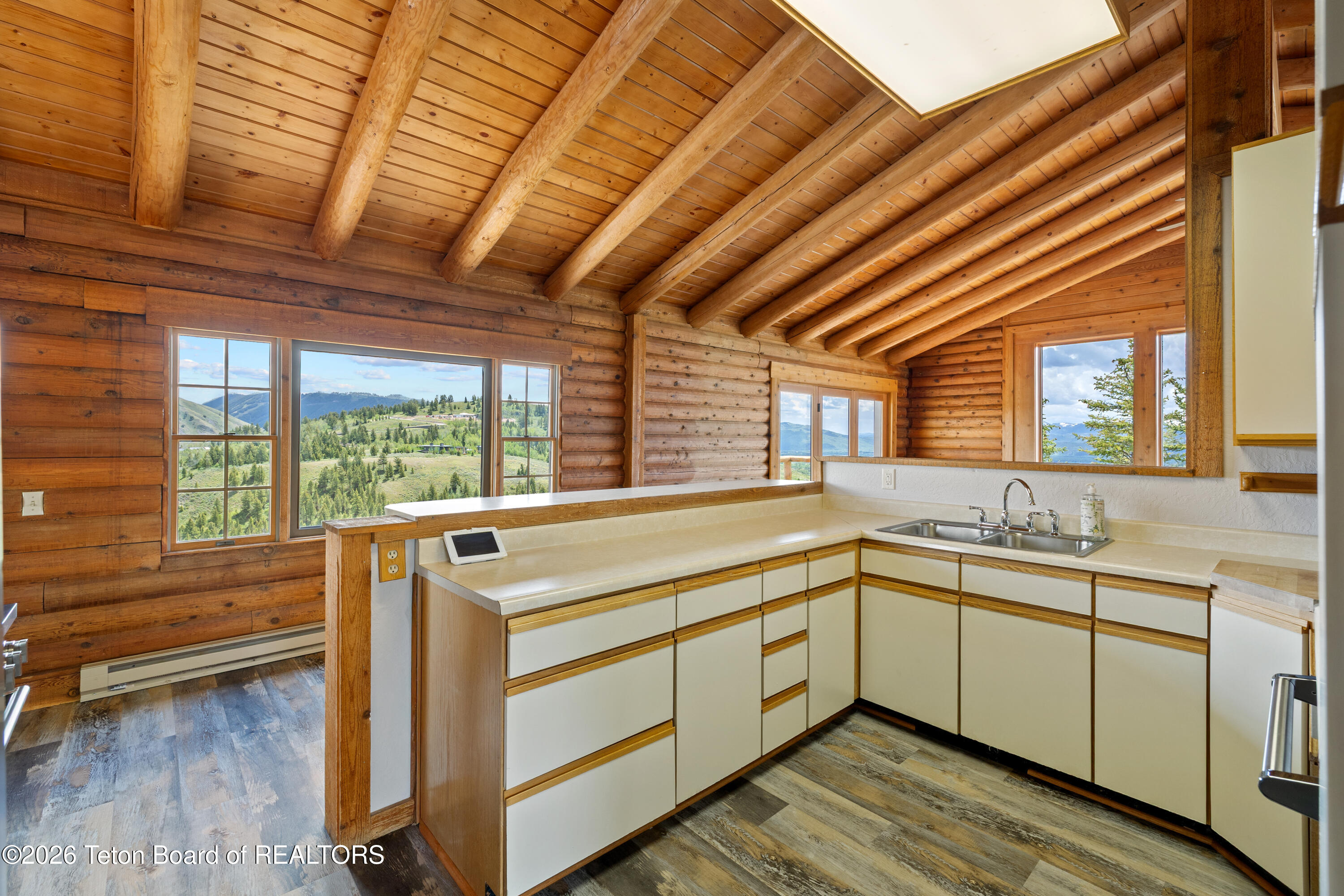 555 Ridgeview Drive Jackson, WY 83001 - Photo 10 of 23 10 Kitchen Island and Windows