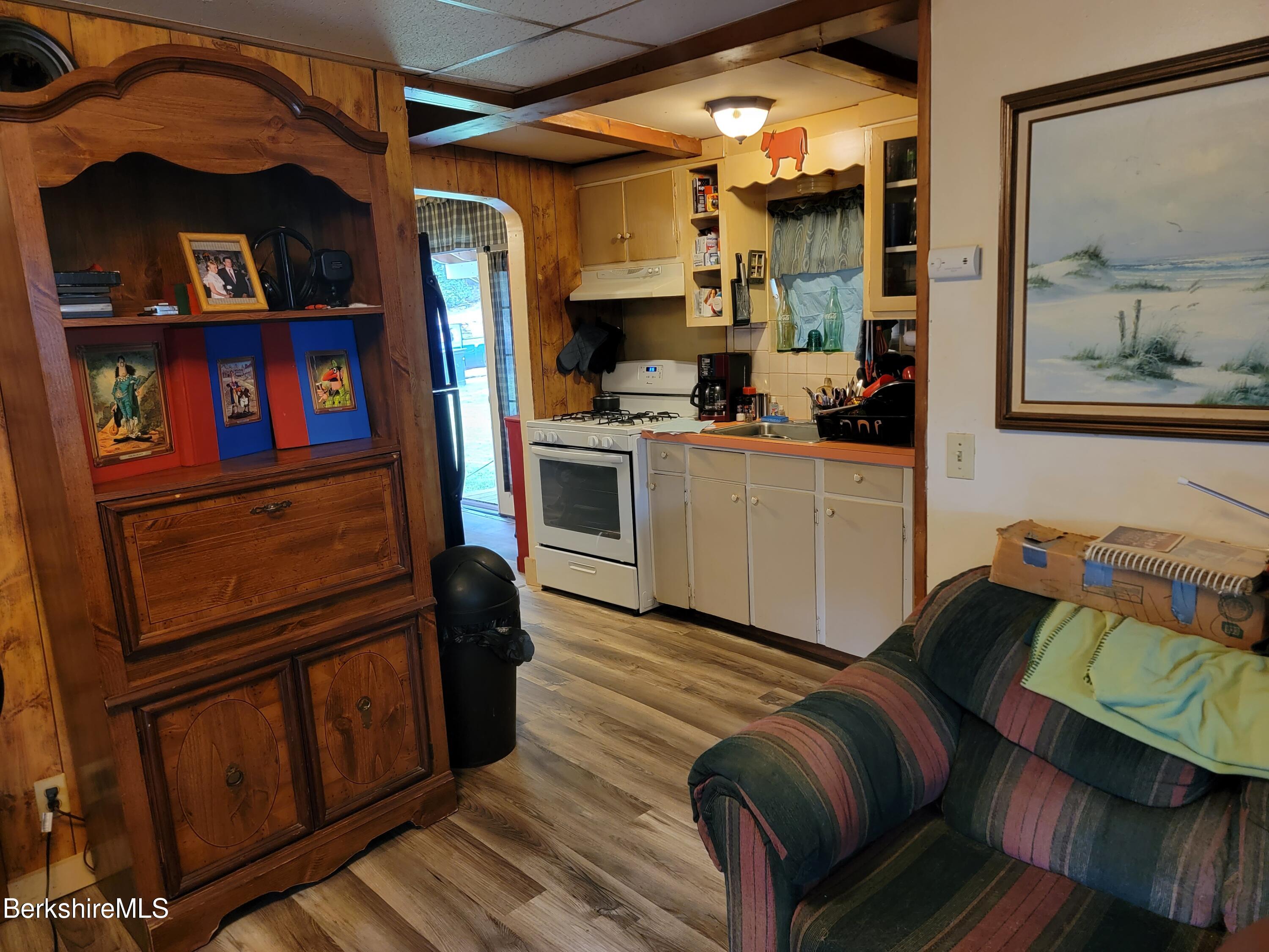 661 Main Road Savoy, MA 01256 - Photo 17 of 24 apt c living into kitchen