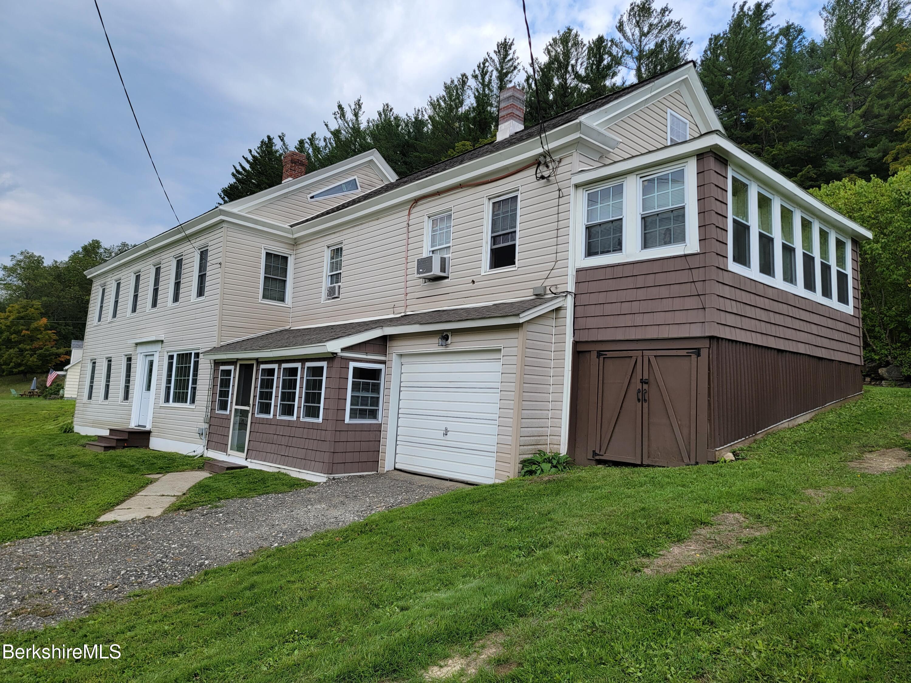 661 Main Road Savoy, MA 01256 - Photo 3 of 24 front apt a garage - apt c porch