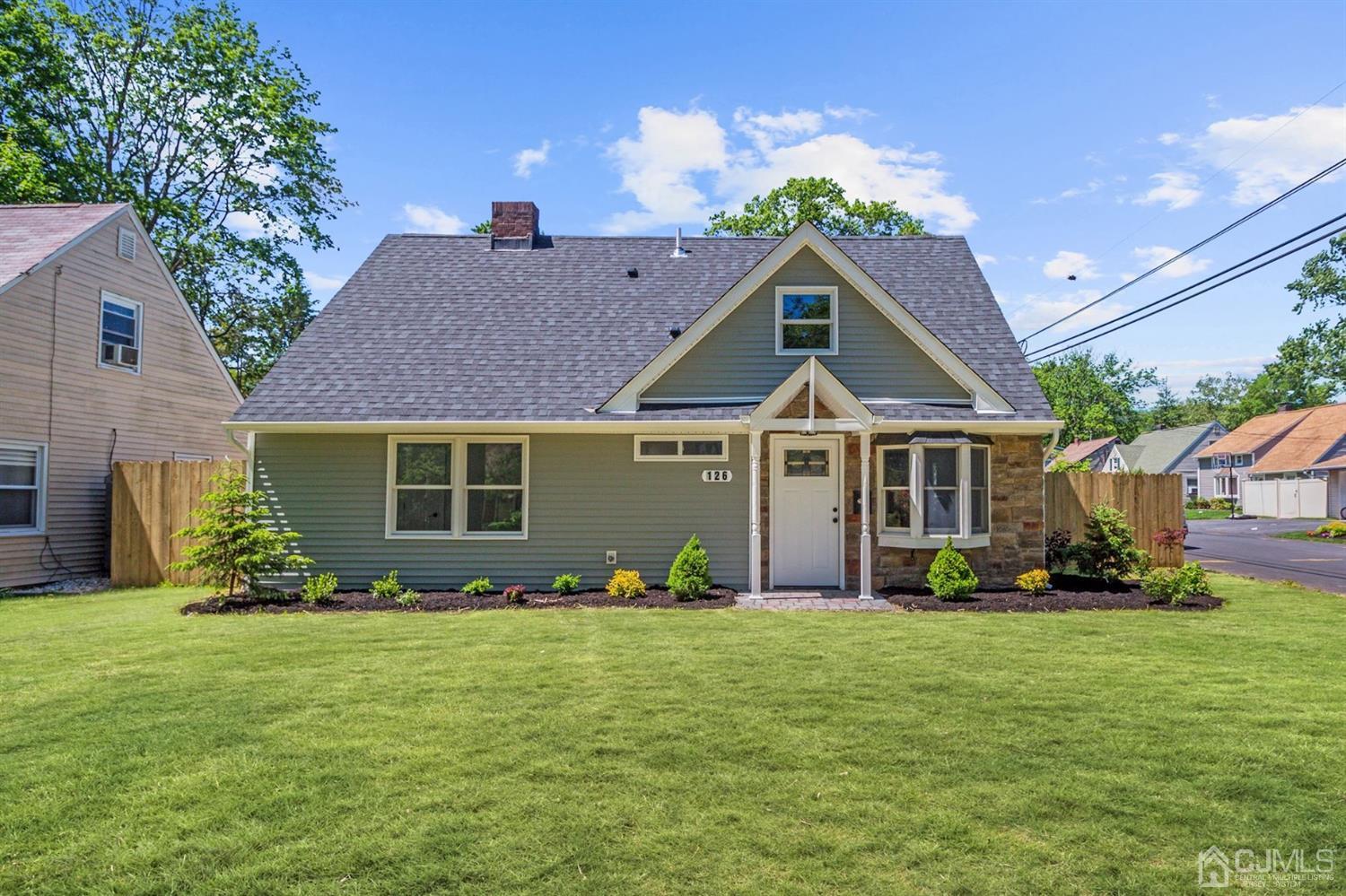 126 Greenbrook Road Green Brook, NJ 08812 - Photo 2 of 36 a front view of a house with garden