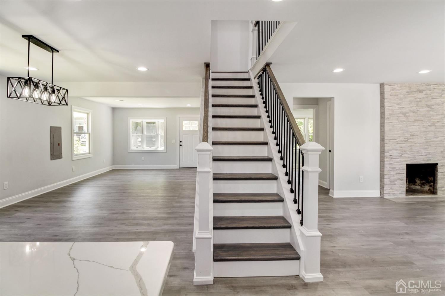 126 Greenbrook Road Green Brook, NJ 08812 - Photo 12 of 36 a view of entryway and hall with wooden floor