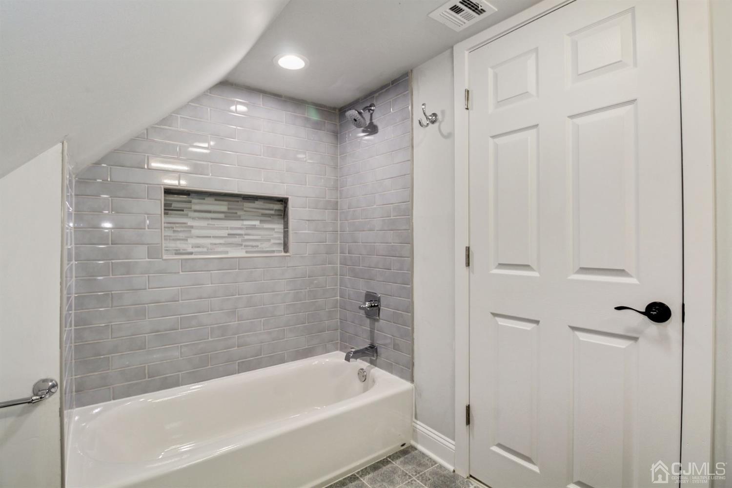 126 Greenbrook Road Green Brook, NJ 08812 - Photo 28 of 36 a bathroom with a bathtub and a shower