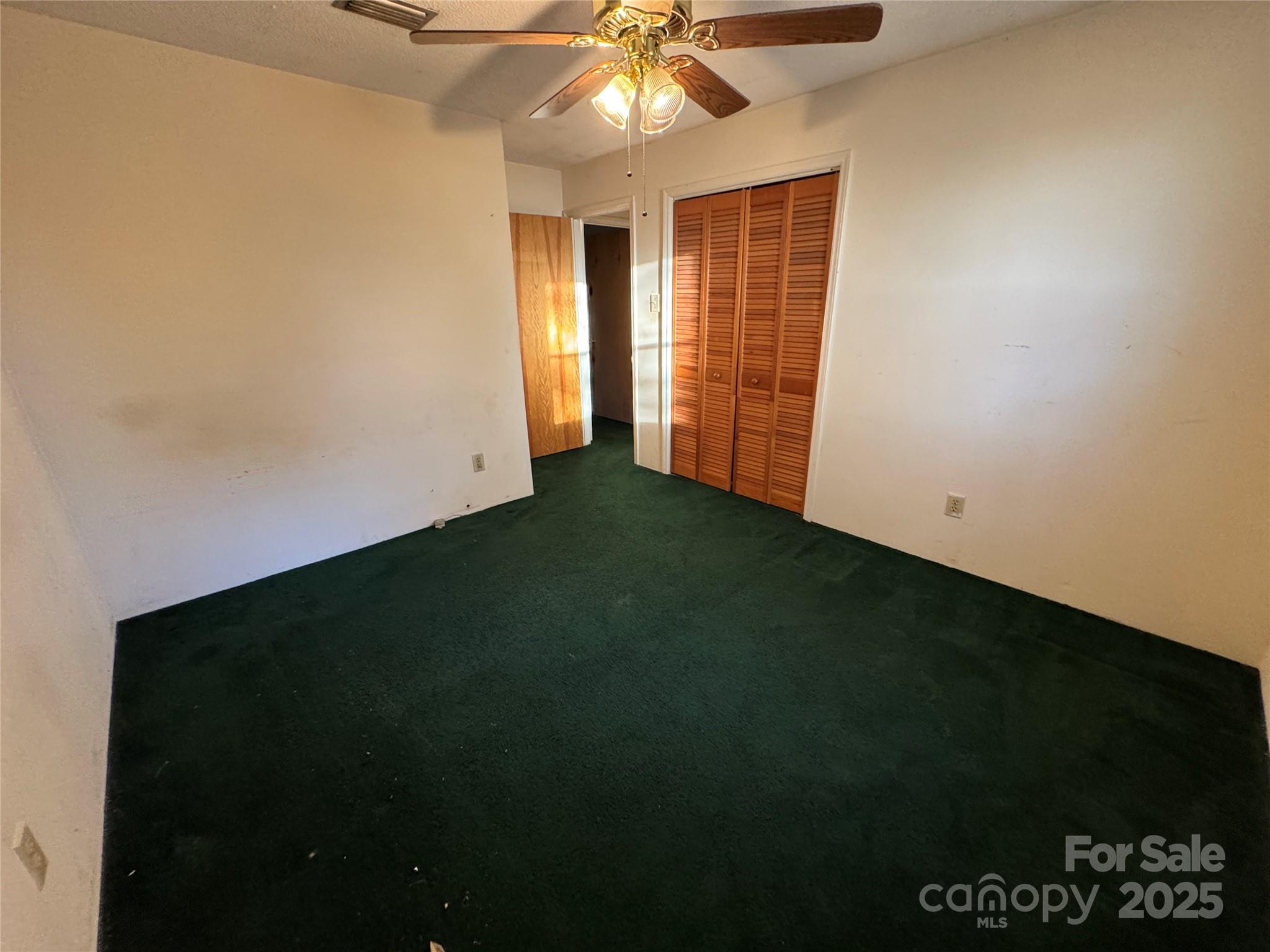 4770 Needmore Road Woodleaf, NC 27054 - Photo 8 of 19 wooden floor in an empty room