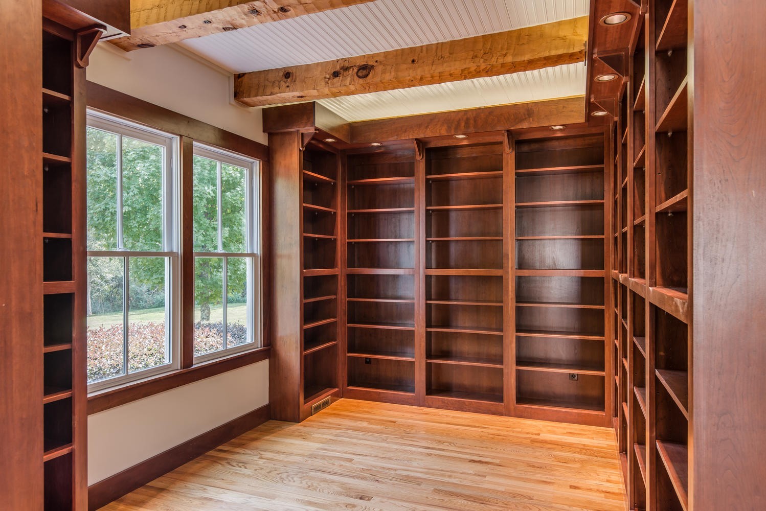 1091 Tulloss Road Franklin, TN 37067 - Photo 12 of 52 a view of an empty room with a fireplace and a window