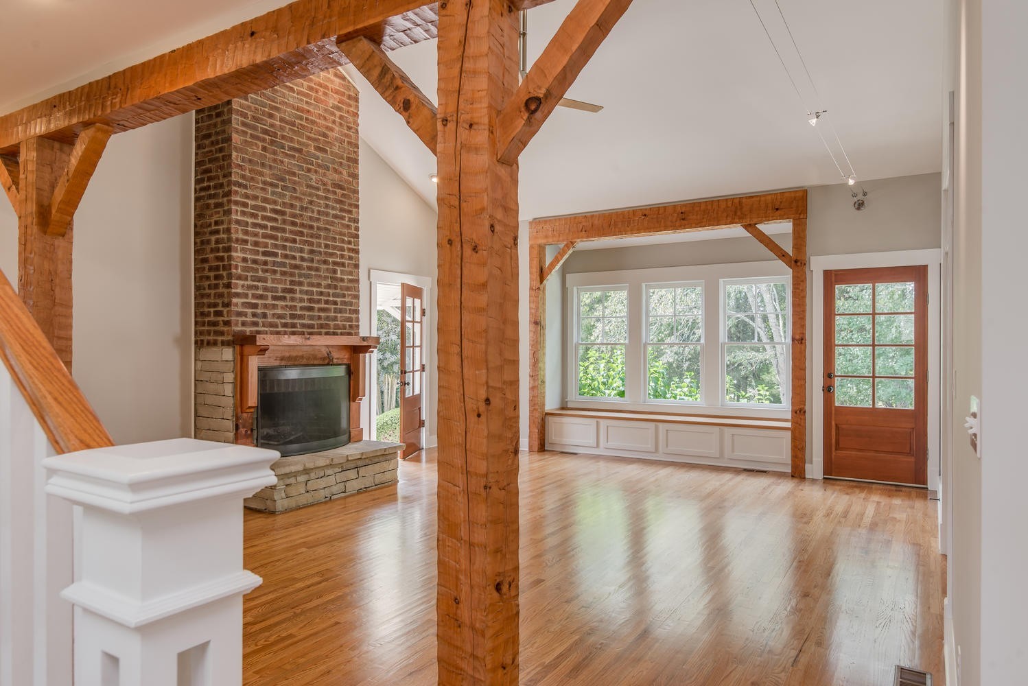 1091 Tulloss Road Franklin, TN 37067 - Photo 13 of 52 a view of a hallway with furniture and a fireplace
