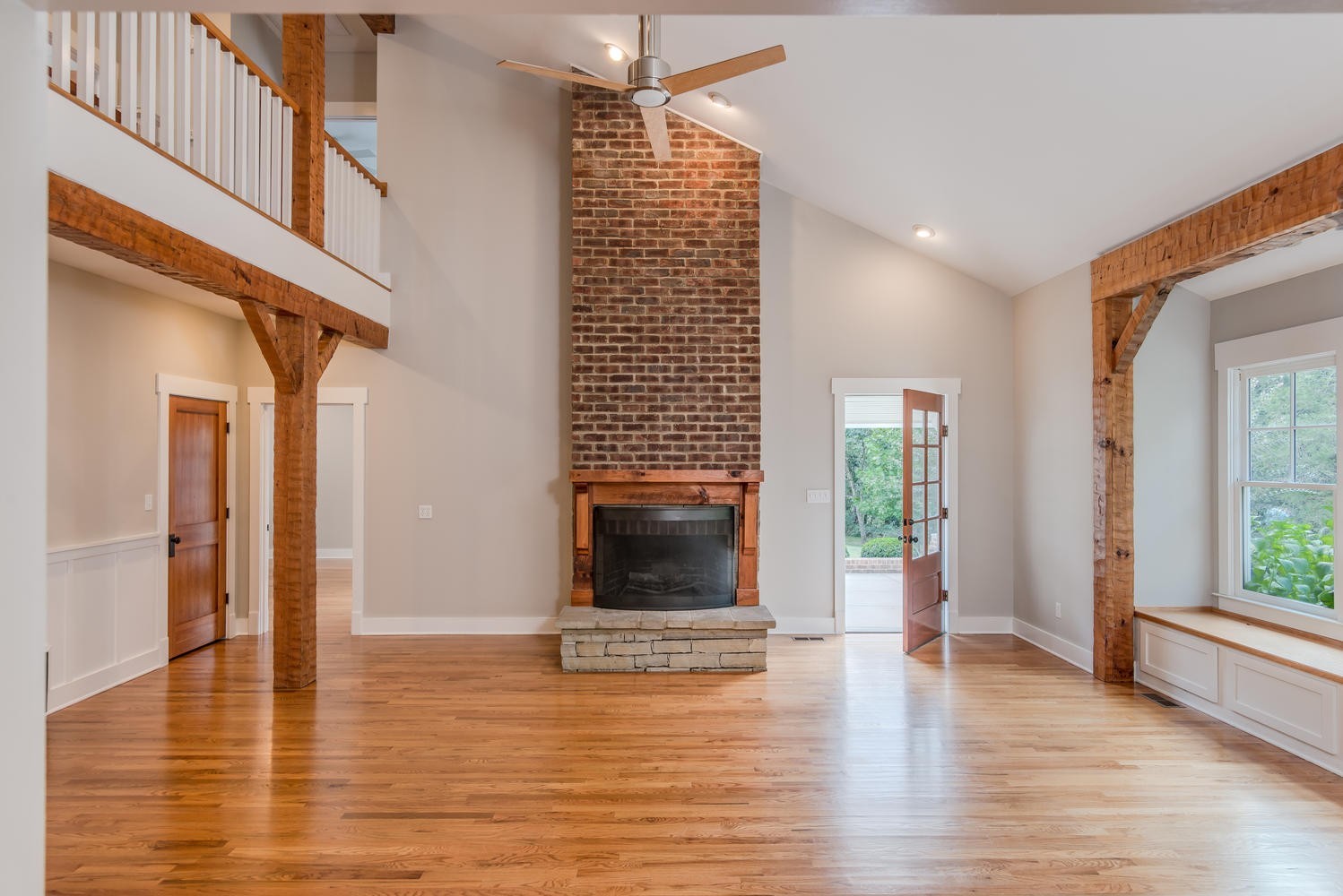 1091 Tulloss Road Franklin, TN 37067 - Photo 15 of 52 a view of an empty room with window and wooden floor