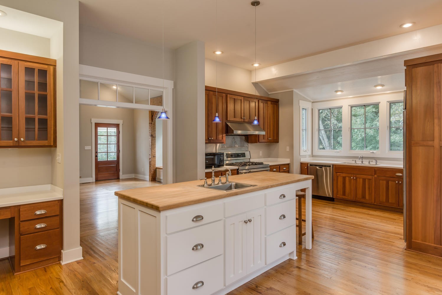 1091 Tulloss Road Franklin, TN 37067 - Photo 21 of 52 a spacious bathroom with a granite countertop sink and a large mirror