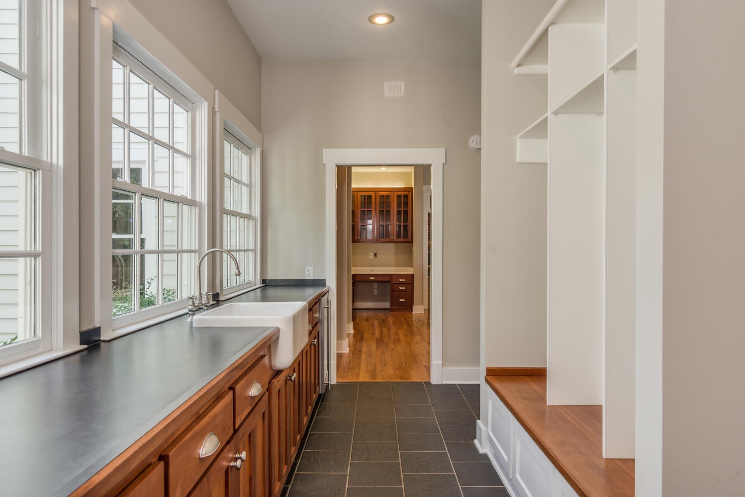 1091 Tulloss Road Franklin, TN 37067 - Photo 26 of 52 a kitchen with a sink and refrigerator