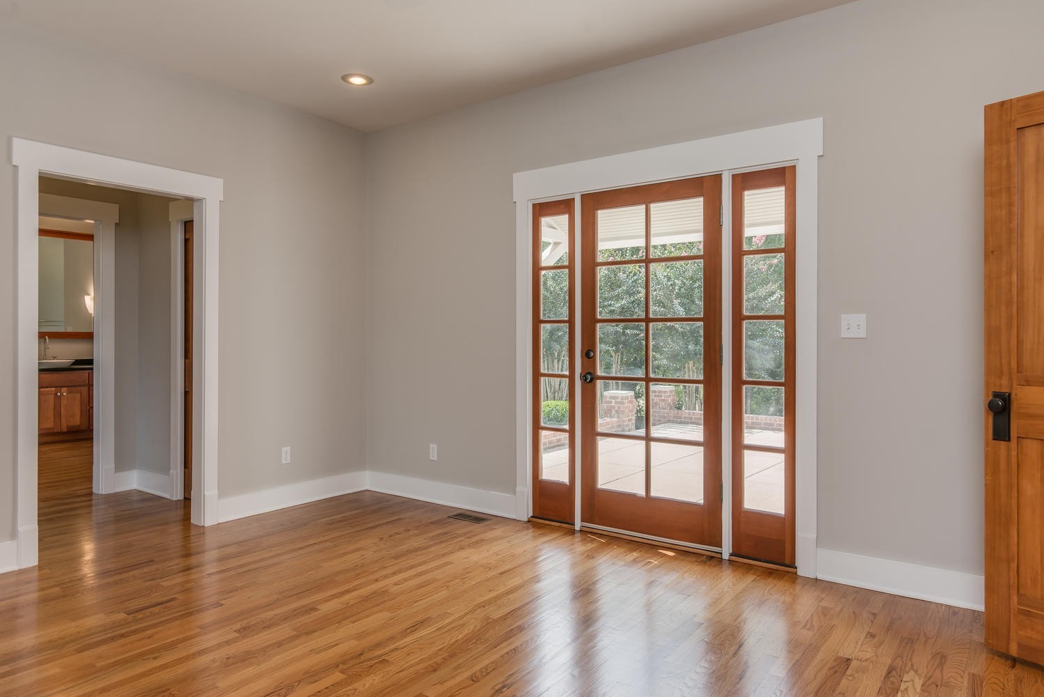 1091 Tulloss Road Franklin, TN 37067 - Photo 29 of 52 a view of an empty room with wooden floor and a window