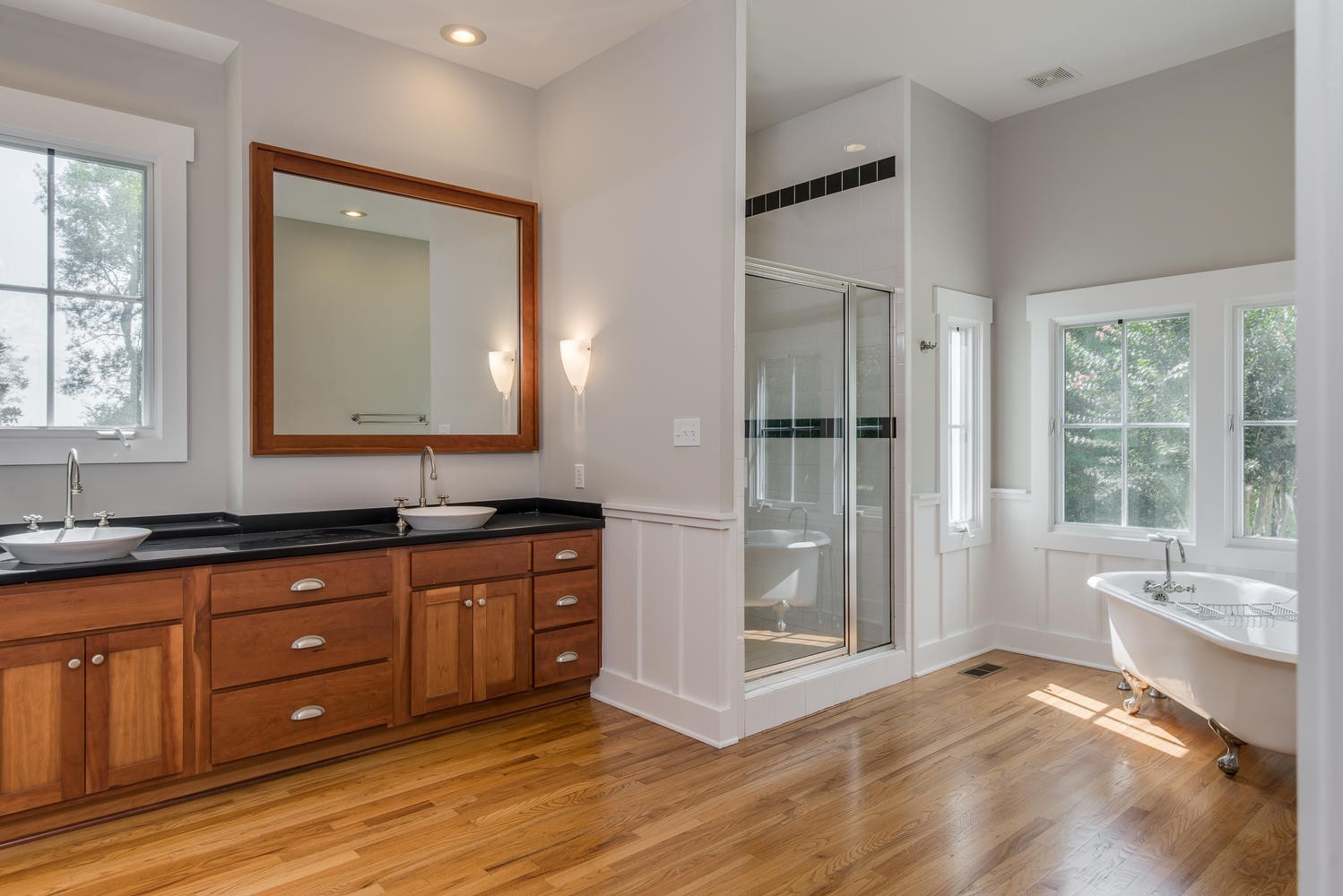 1091 Tulloss Road Franklin, TN 37067 - Photo 31 of 52 a spacious bathroom with a tub sink and mirror