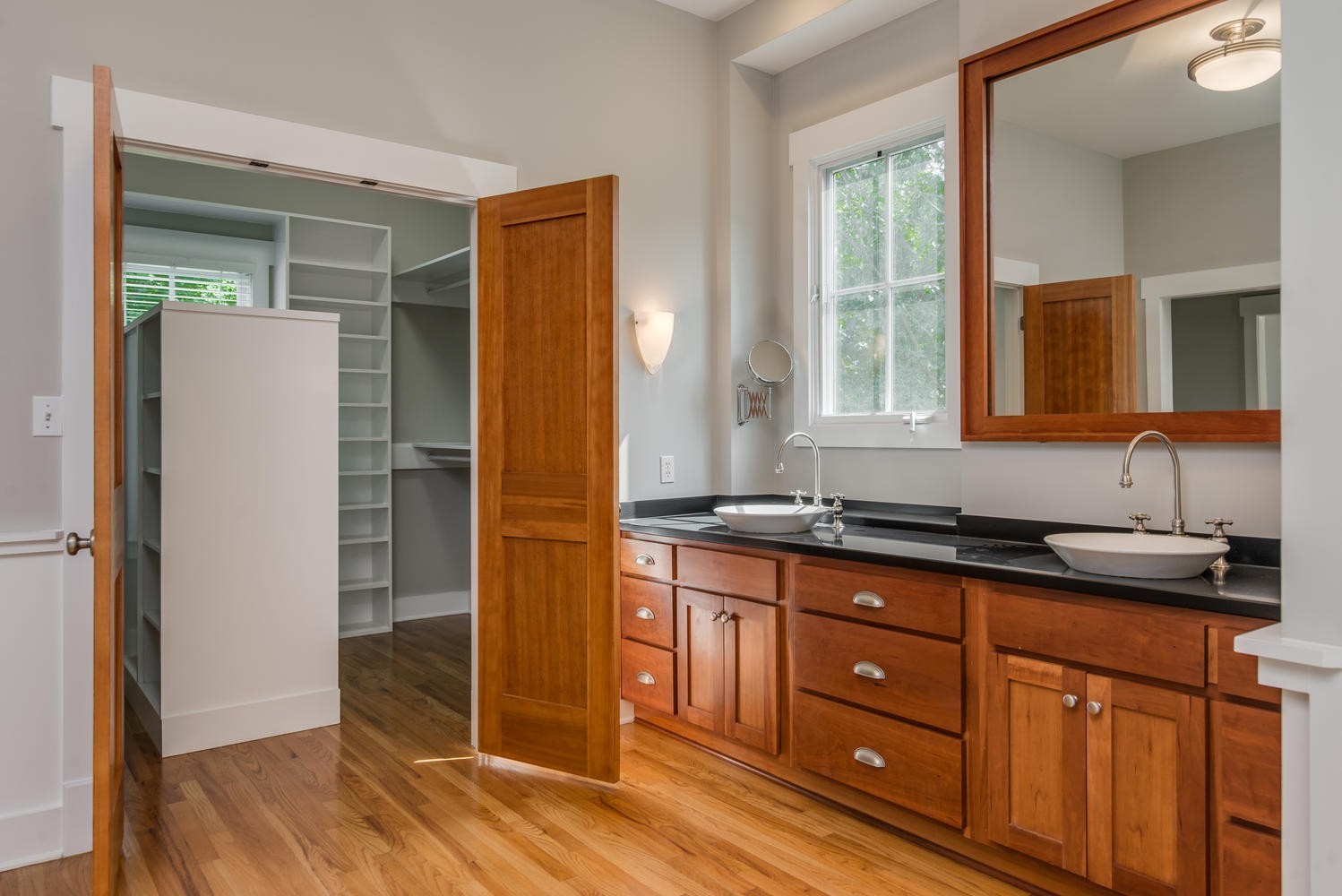 1091 Tulloss Road Franklin, TN 37067 - Photo 33 of 52 a kitchen with stainless steel appliances granite countertop a refrigerator and a sink