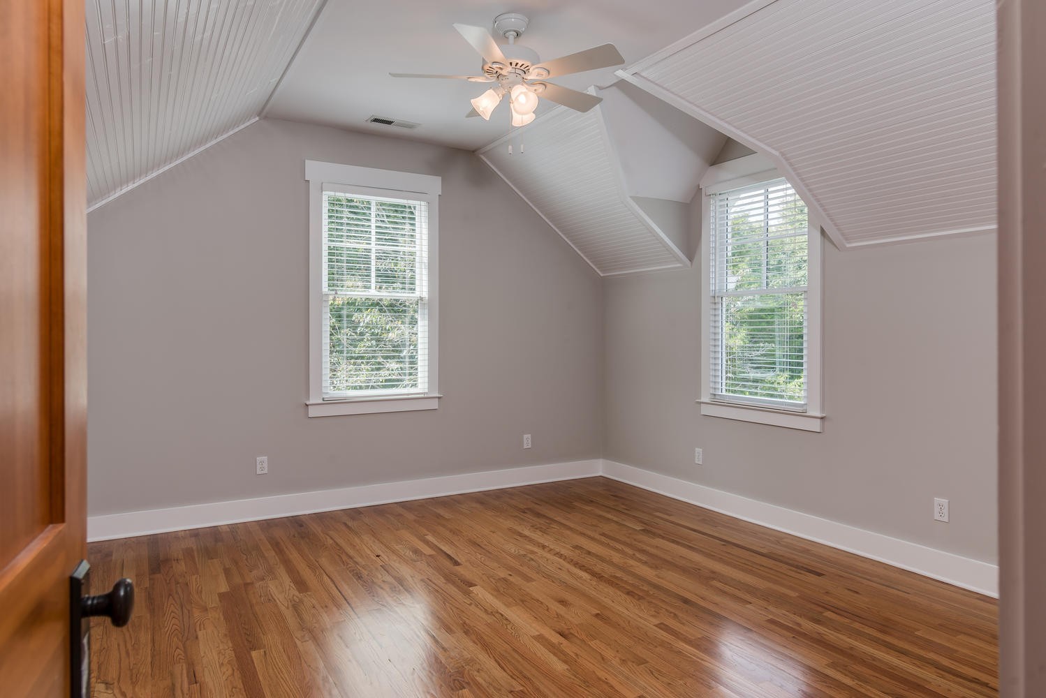 1091 Tulloss Road Franklin, TN 37067 - Photo 39 of 52 a view of empty room with wooden floor and fan