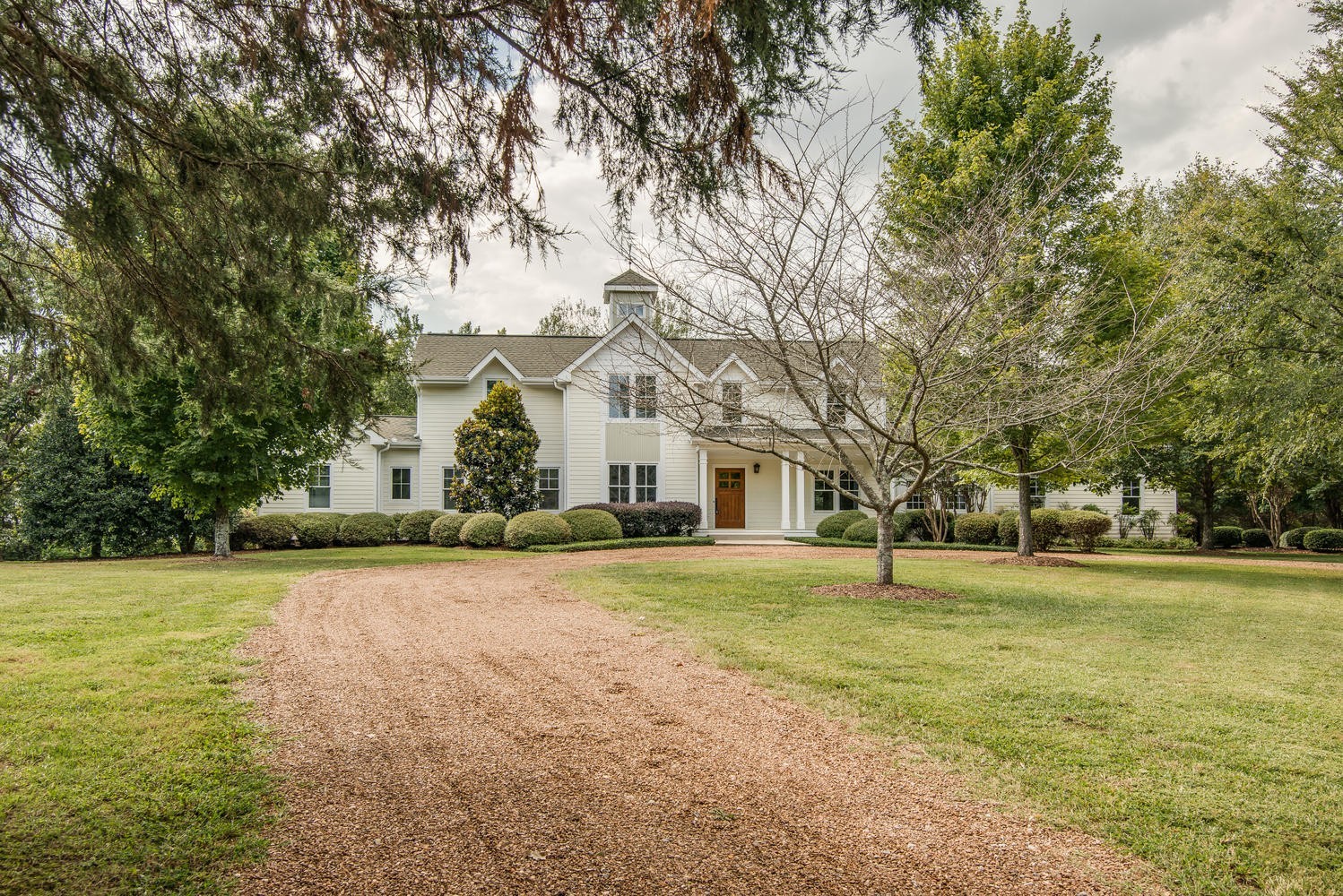 1091 Tulloss Road Franklin, TN 37067 - Photo 4 of 52 a view of a trees in front of a house
