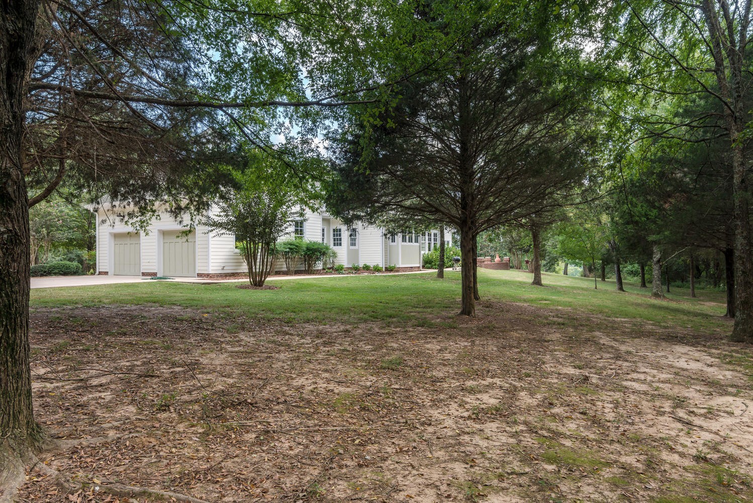 1091 Tulloss Road Franklin, TN 37067 - Photo 48 of 52 a view of a house with a backyard
