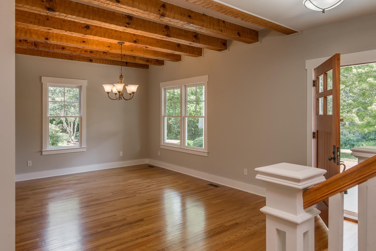 1091 Tulloss Road Franklin, TN 37067 - Photo 9 of 52 a view of a porch with a table and chairs