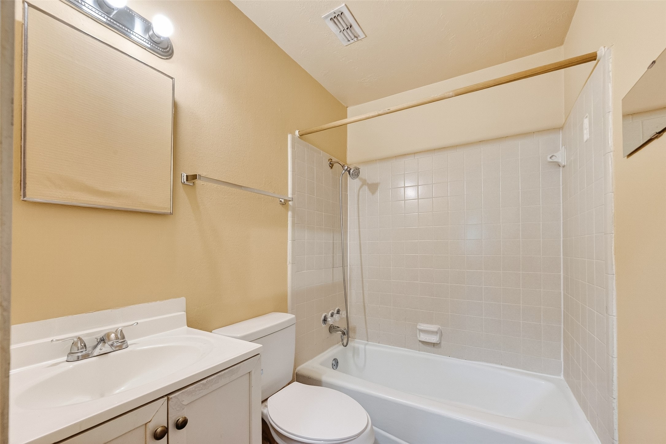 4826 Redfish Reef Drive Bacliff, TX 77518 - Photo 14 of 25 a bathroom with a sink a toilet and shower