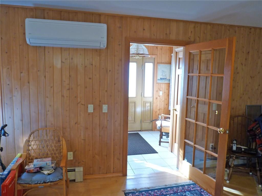 472 North Bend Road Surry, ME 04684 - Photo 17 of 35 Living room looking towards mudroom.
