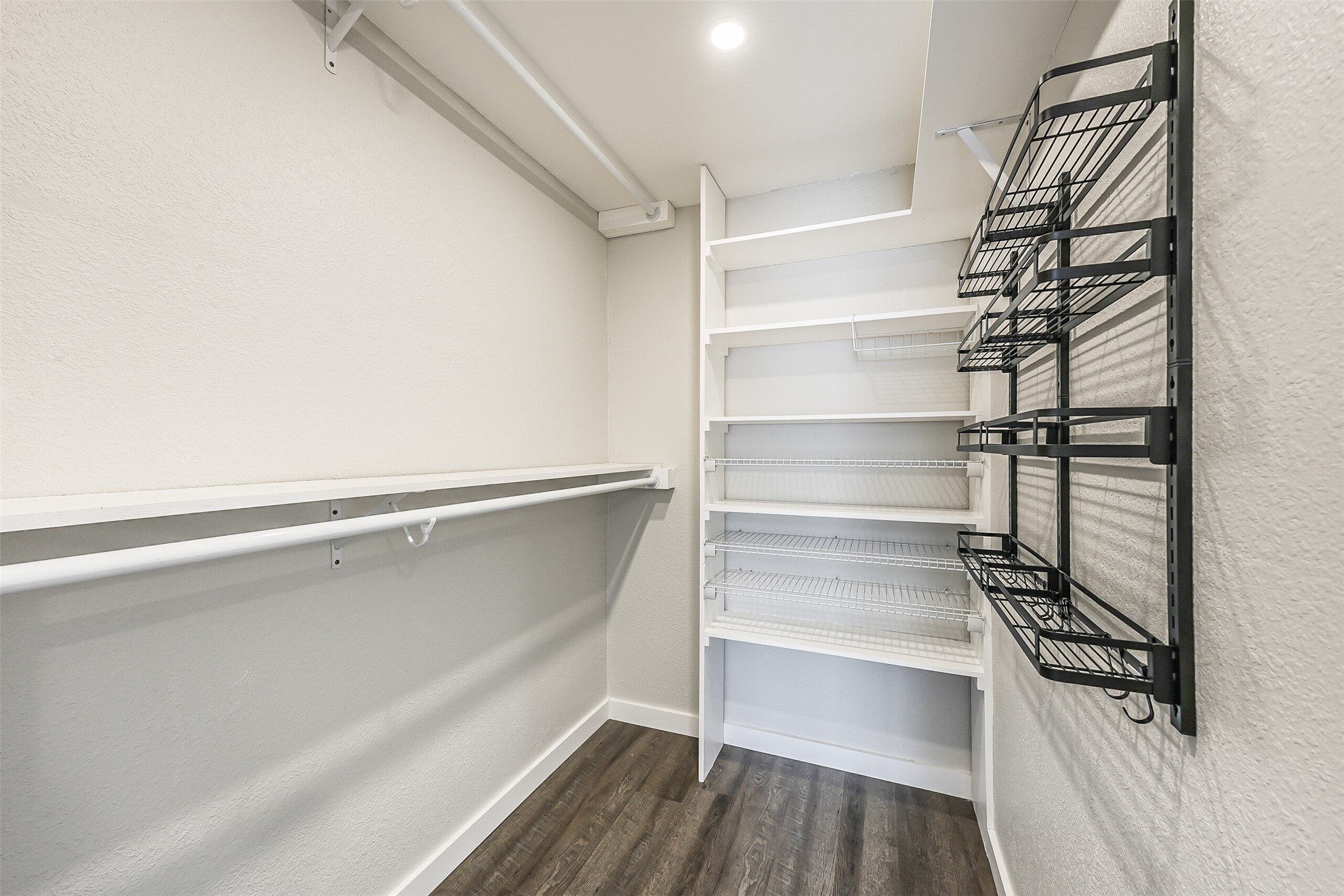 1500 Bay Area Boulevard, Unit 294 Houston, TX 77058 - Photo 14 of 36 a view of walk in closet with empty racks