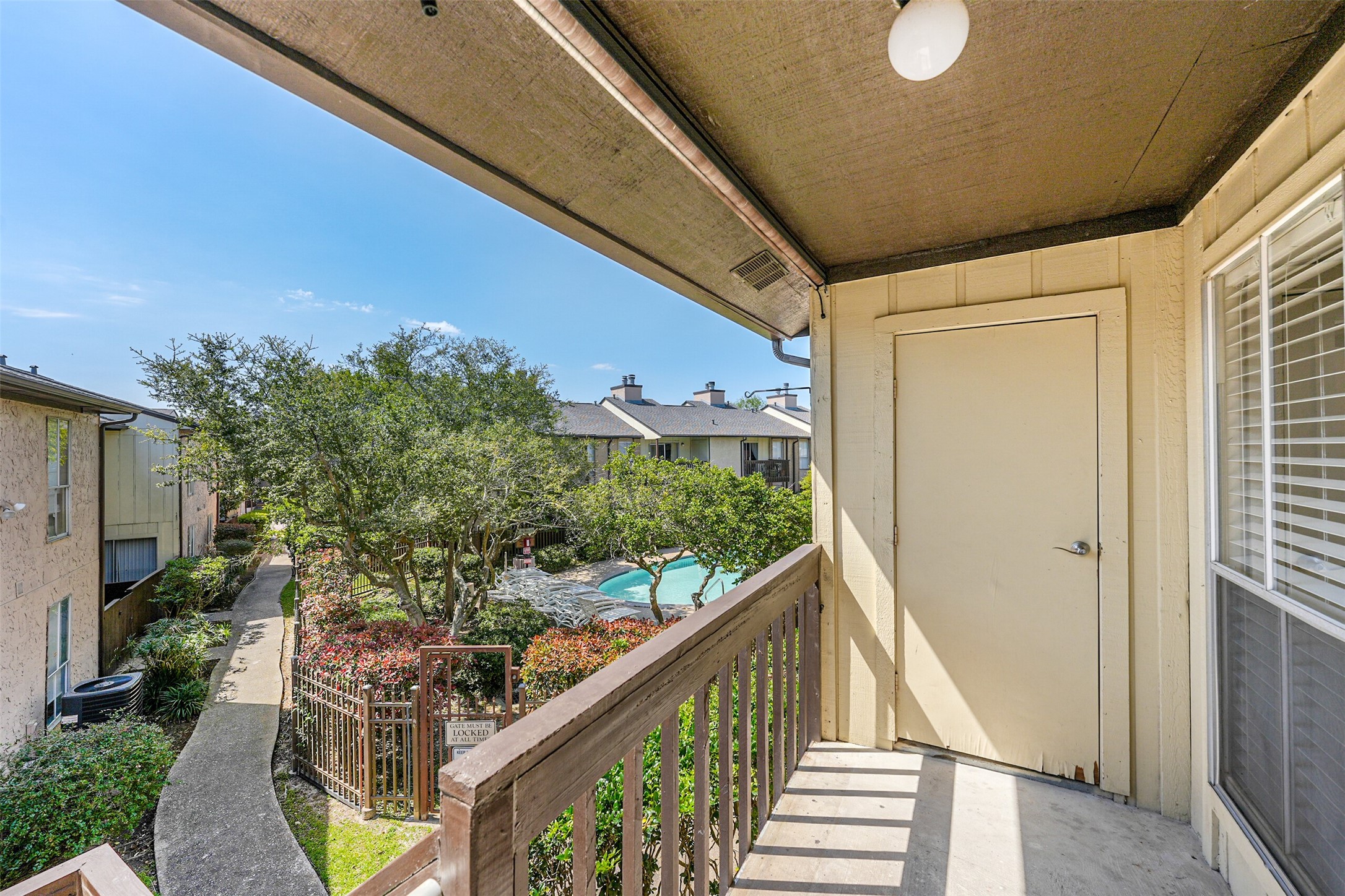 1500 Bay Area Boulevard, Unit 294 Houston, TX 77058 - Photo 20 of 36 a city view from a balcony