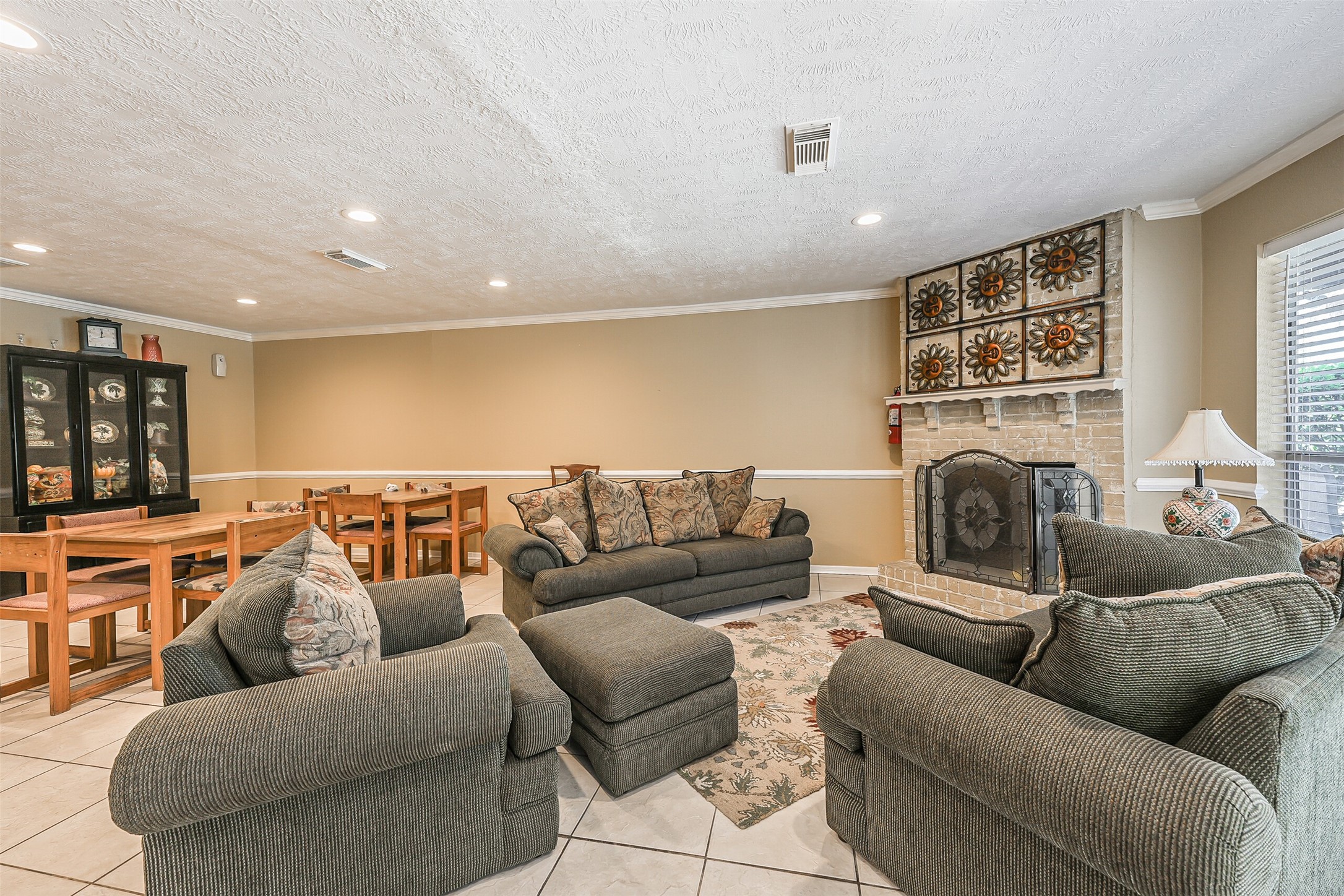 1500 Bay Area Boulevard, Unit 294 Houston, TX 77058 - Photo 28 of 36 a living room with furniture and a fireplace