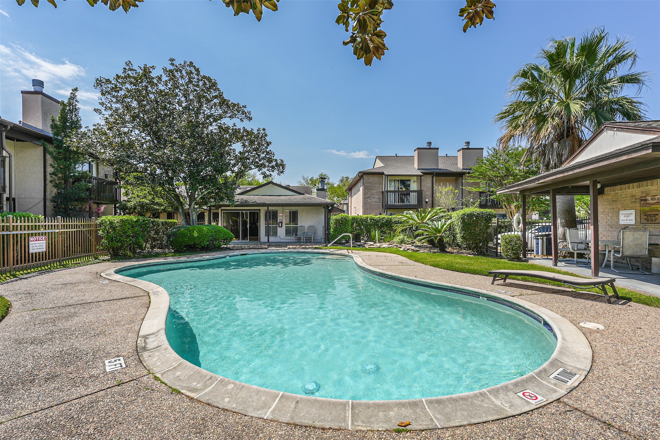 1500 Bay Area Boulevard, Unit 294 Houston, TX 77058 - Photo 33 of 36 a view of a house with swimming pool and sitting area