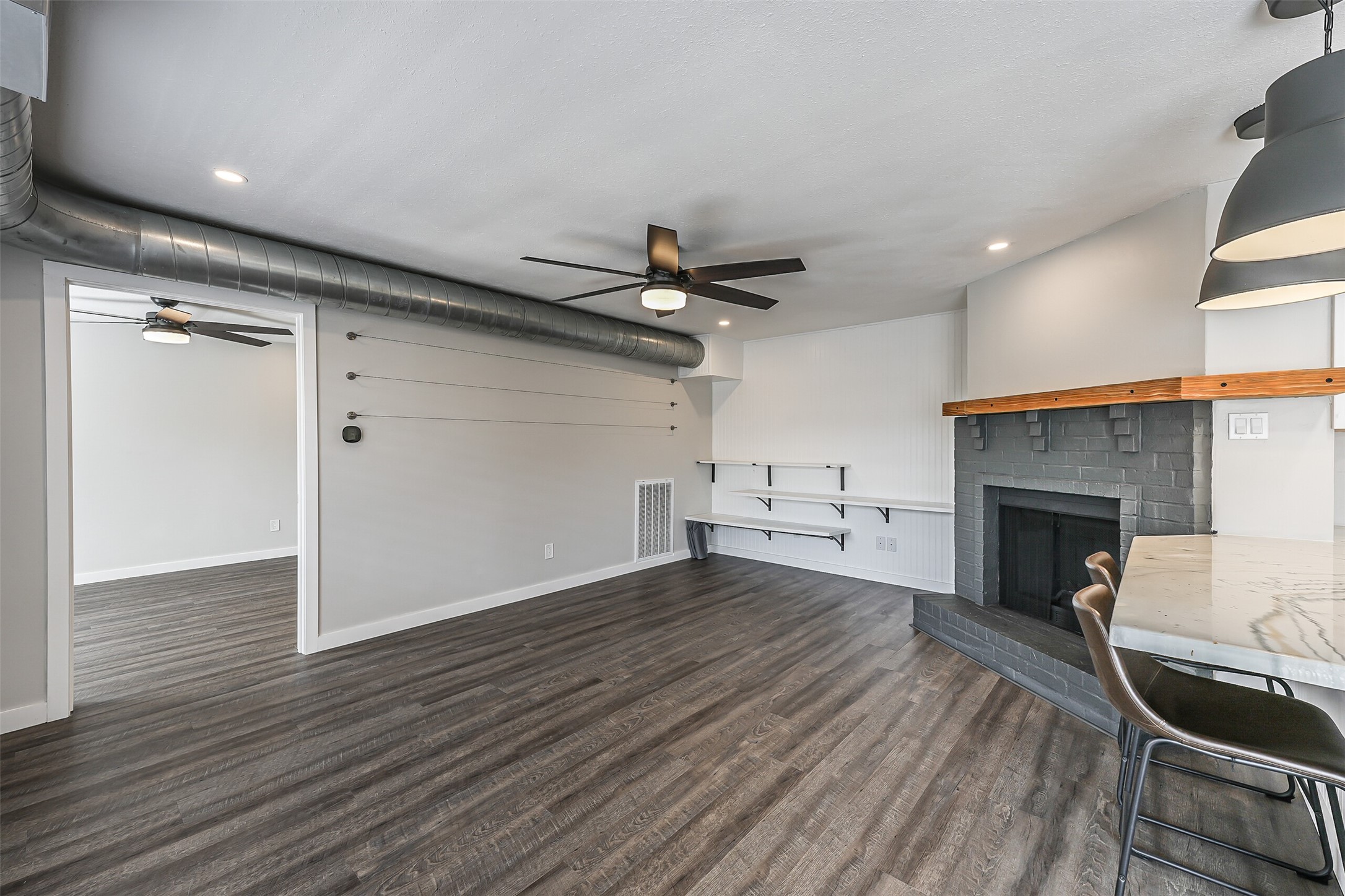 1500 Bay Area Boulevard, Unit 294 Houston, TX 77058 - Photo 3 of 36 a view of a livingroom with a fireplace and window