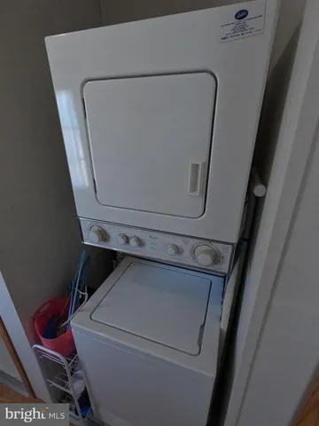 a view of hallway with wooden floor