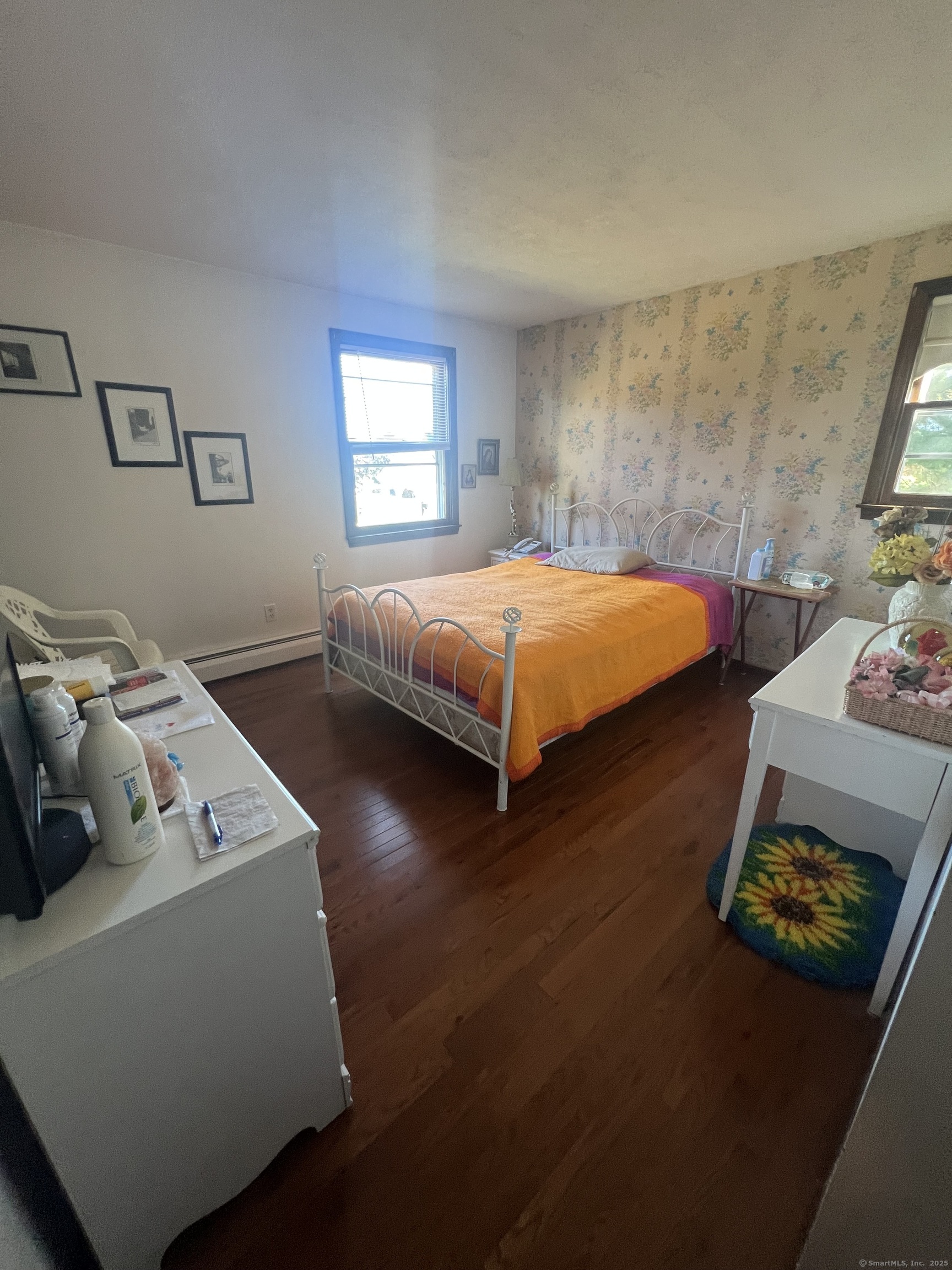 268 Fox Hill Road Wethersfield, CT 06109 - Photo 12 of 25 a bedroom with a bed and a couch