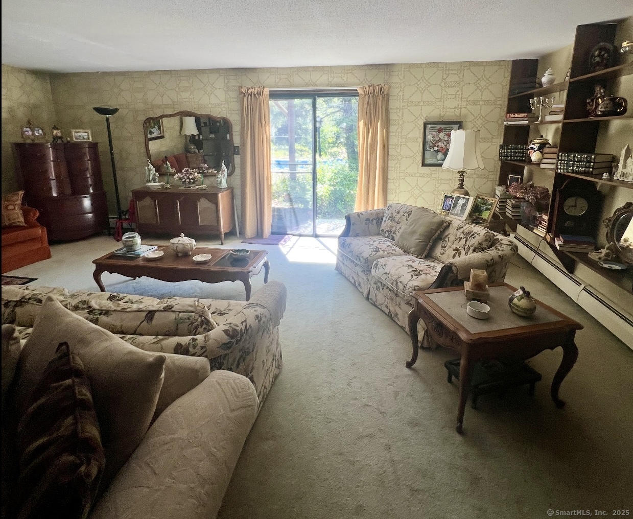 268 Fox Hill Road Wethersfield, CT 06109 - Photo 17 of 25 a living room with furniture and a flat screen tv