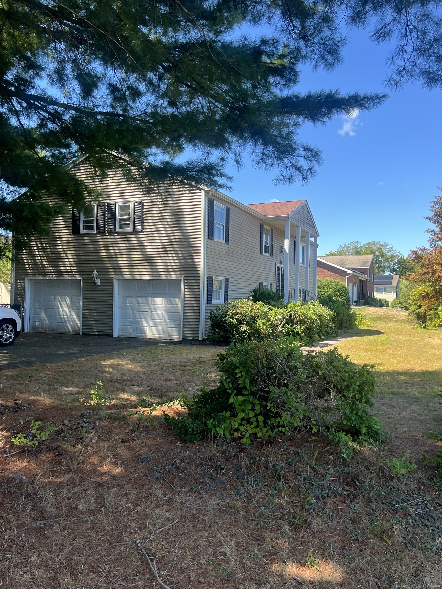 268 Fox Hill Road Wethersfield, CT 06109 - Photo 24 of 25 a view of a house with a yard