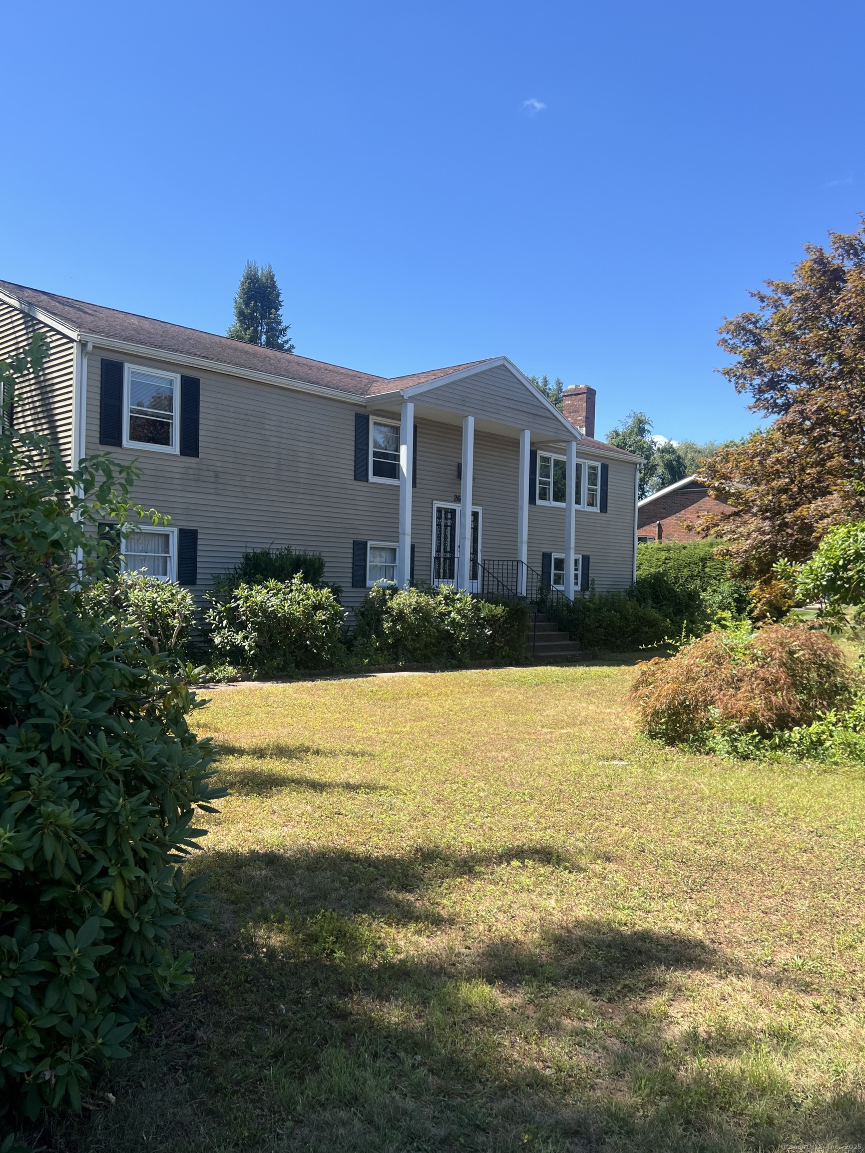268 Fox Hill Road Wethersfield, CT 06109 - Photo 25 of 25 a view of a house with a yard