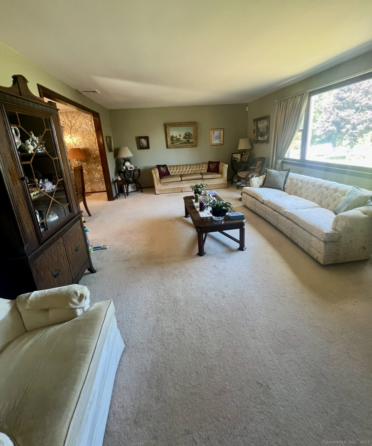 268 Fox Hill Road Wethersfield, CT 06109 - Photo 4 of 25 a living room with furniture and a large window