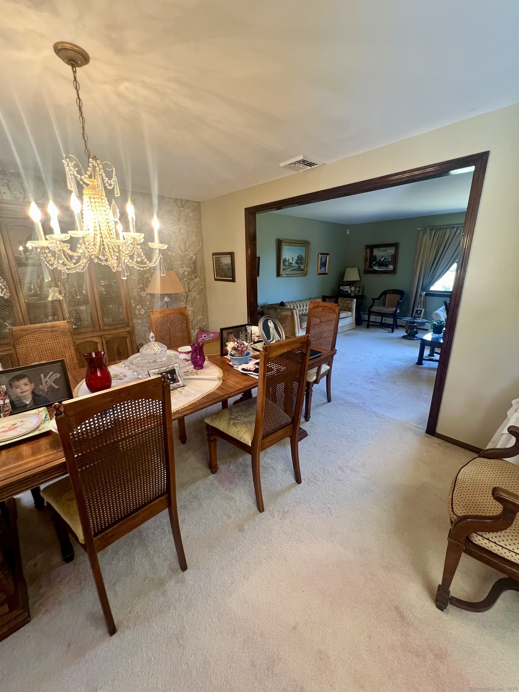 268 Fox Hill Road Wethersfield, CT 06109 - Photo 8 of 25 a living room with furniture a window and gym equipment