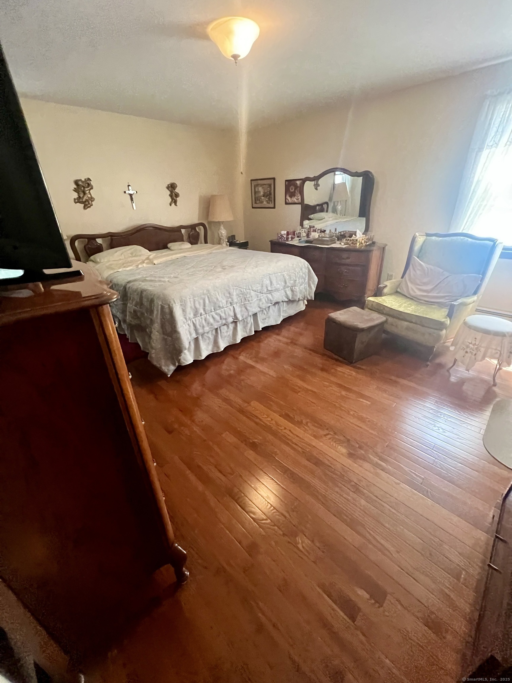 268 Fox Hill Road Wethersfield, CT 06109 - Photo 10 of 25 a bedroom with a bed and window