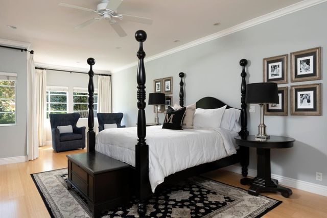 a bedroom with furniture and a table