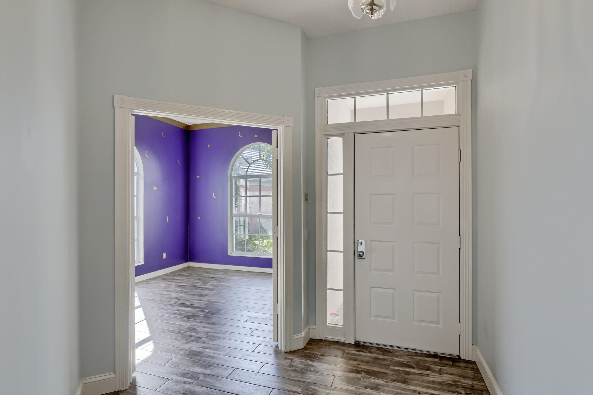 8452 Beaconhill Road Palm Beach Gardens, FL 33410 - Photo 2 of 40 a view of front door with wooden floor
