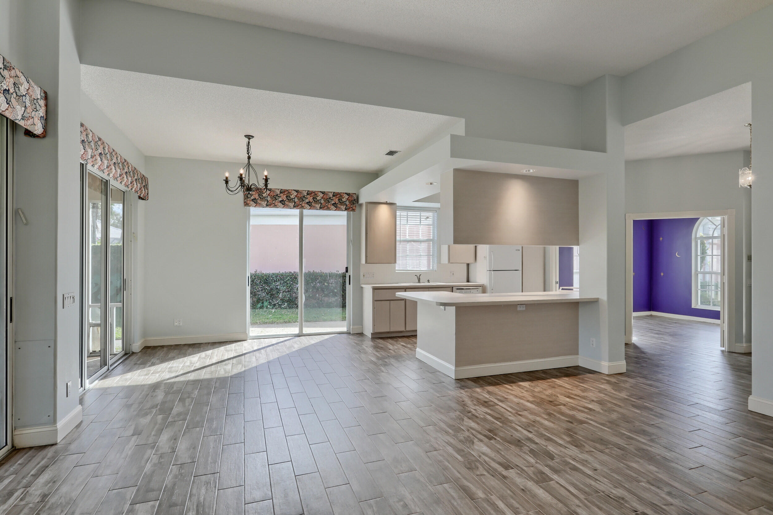 8452 Beaconhill Road Palm Beach Gardens, FL 33410 - Photo 26 of 40 a view of a kitchen with a sink and cabinets
