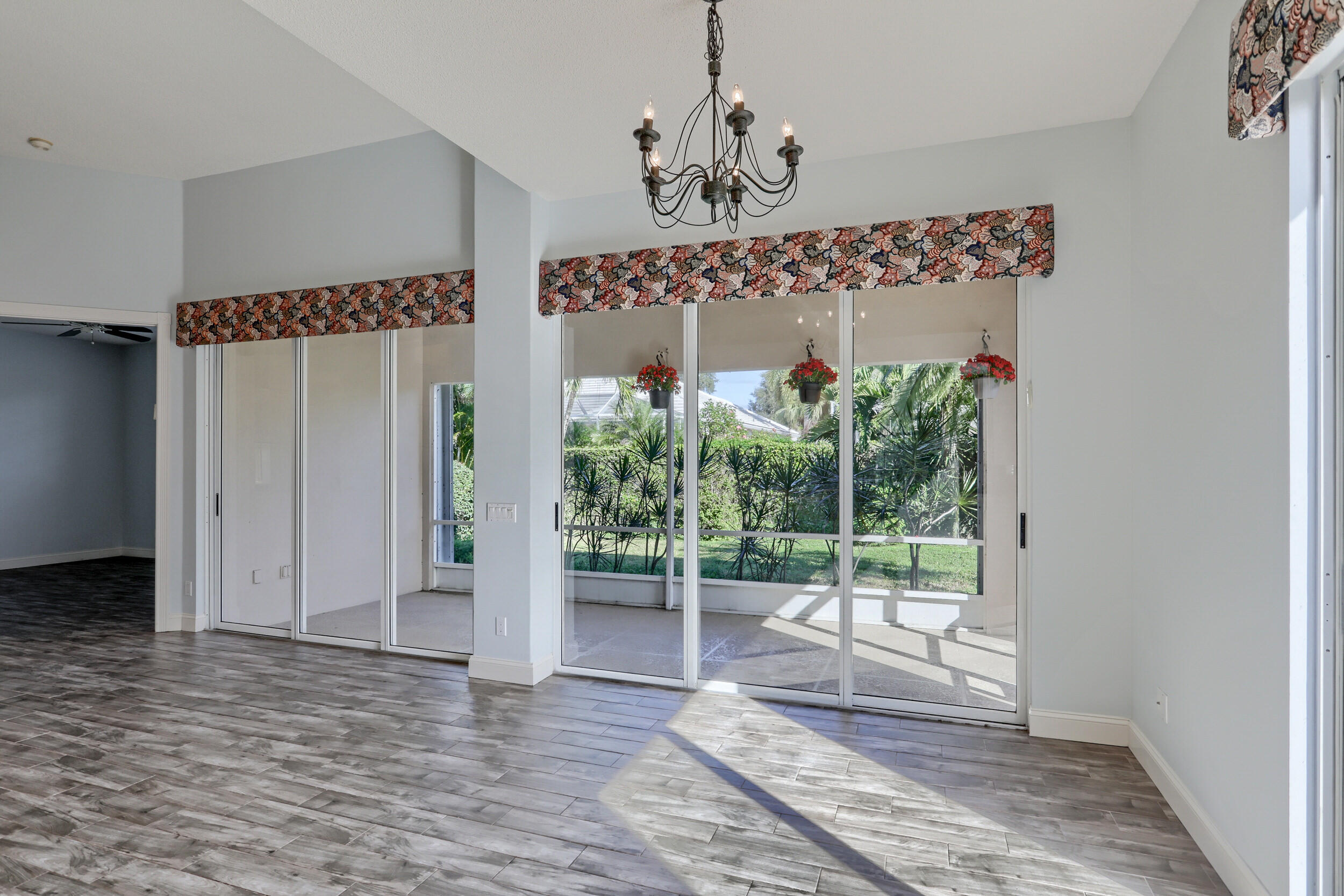 8452 Beaconhill Road Palm Beach Gardens, FL 33410 - Photo 8 of 40 a view of a room with a large window