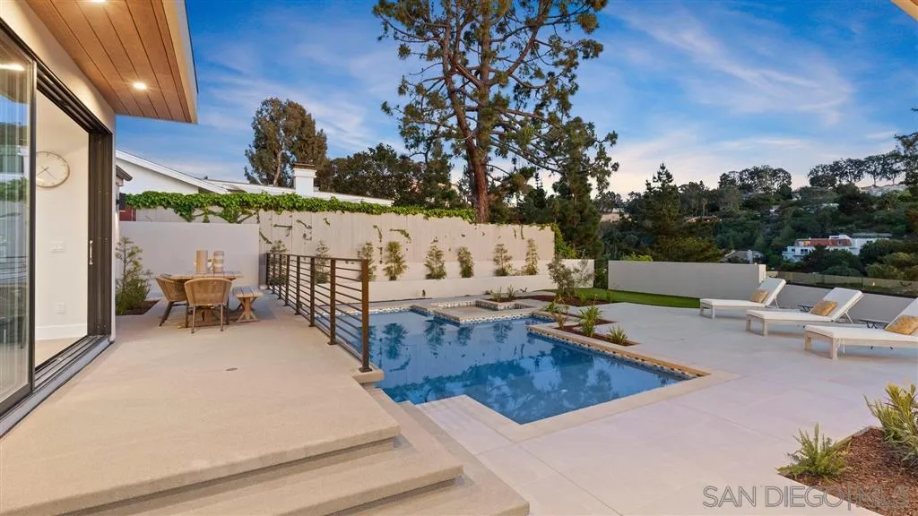 1631 Marisma Way La Jolla, CA 92037 - Photo 18 of 25 a view of swimming pool with outdoor seating and plants