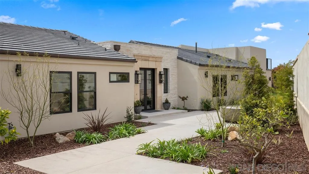1631 Marisma Way La Jolla, CA 92037 - Photo 3 of 25 a front view of a house with garden