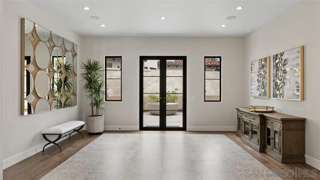 1631 Marisma Way La Jolla, CA 92037 - Photo 5 of 25 wooden floor and windows in a room