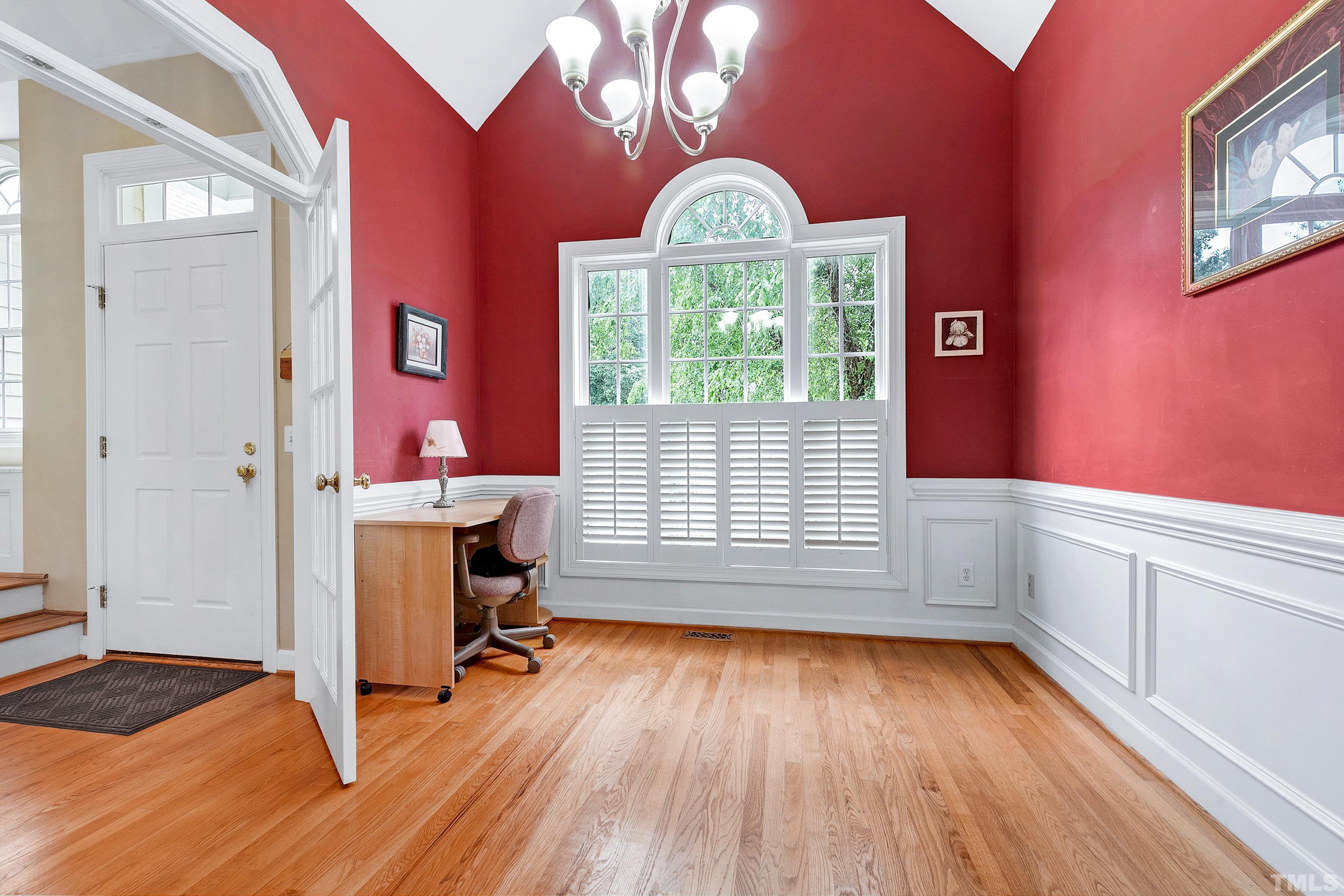 909 Cedar Downs Drive Raleigh, NC 27607 - Photo 7 of 32 a view of room with window and wooden floor