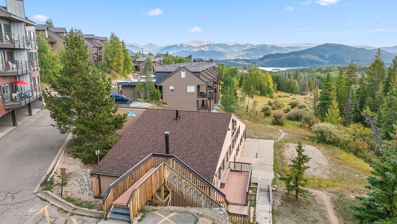 9849 Ryan Gulch Road, Unit 203 Silverthorne, CO 80498 - Photo 27 of 35 a view of a city with a mountain